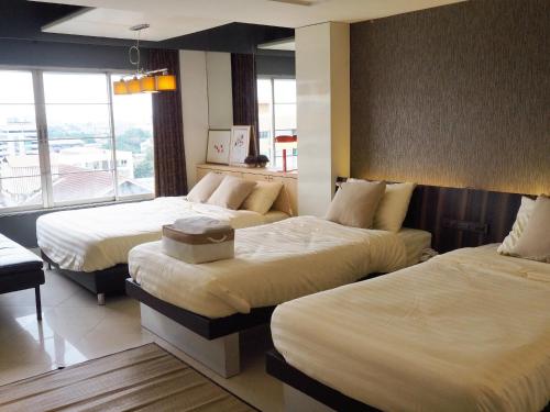 Postel nebo postele na pokoji v ubytování Casa Nimmana City View 3Beds 4Pax - Nimman