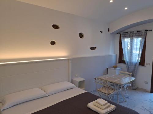 Postel nebo postele na pokoji v ubytování San Francesco Tropea Accomodation 2