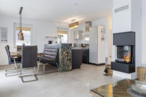 Η κουζίνα ή μικρή κουζίνα στο Haus Strandsegler unter Reet OFC 30