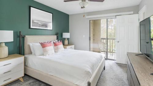 Ένα ή περισσότερα κρεβάτια σε δωμάτιο στο Landing Apartments - Jacksonville