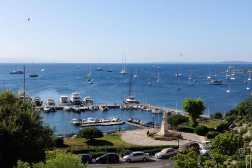 a harbor filled with lots of boats in the water at Albergo Botti in Corfu Town