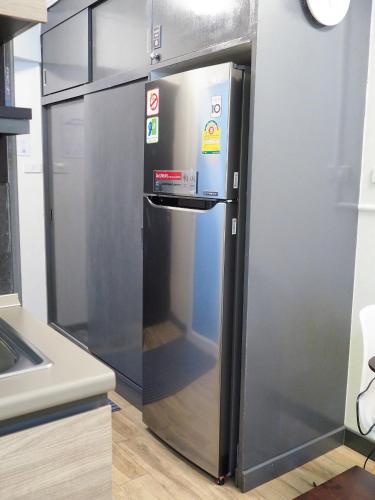 Kuchyň nebo kuchyňský kout v ubytování Casa Nimmana King Bed 4Pax - Nimman