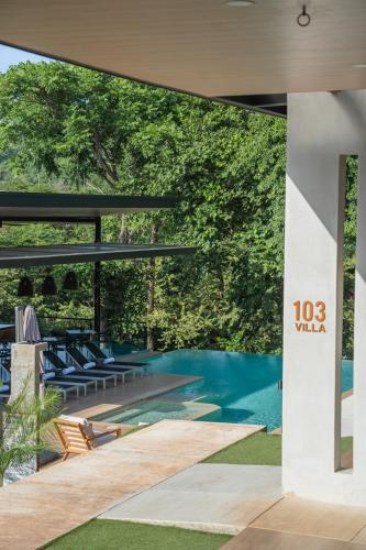a view of the pool from the house at Epic Tamarindo Boutique Hotel in Tamarindo