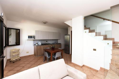 a living room with a couch and a table at Liza 1 in Palazzo Vianello