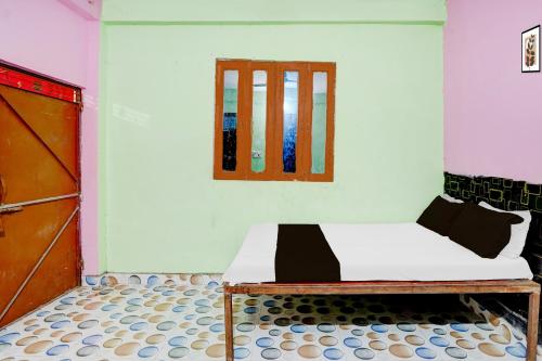 Katil atau katil-katil dalam bilik di SPOT ON Parihar Hotel