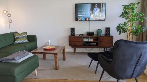 TV a/nebo společenská místnost v ubytování Ferienwohnung Hygge