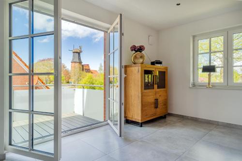 Φωτογραφία από το άλμπουμ του Mühlenblick 4, OG mit Balkon und Mühlenblick in zentraler Lage! σε Hage