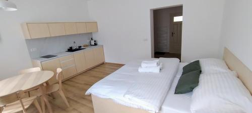Postel nebo postele na pokoji v ubytování Vila Krupička