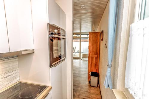 Η κουζίνα ή μικρή κουζίνα στο Ferienhaus Seen-Sucht