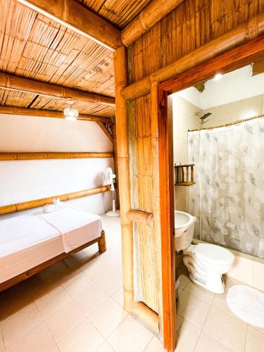 Cama o camas de una habitación en Marina Hosteria