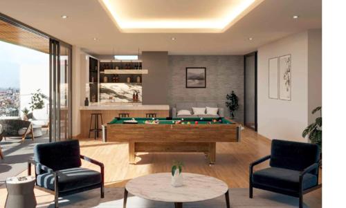a living room with a pool table and two chairs at Departamento de Estreno en Arequipa, tres dormitorios in Cayma