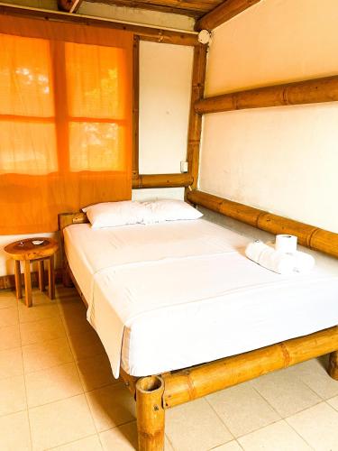 Cama o camas de una habitación en Marina Hosteria