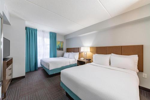 Katil atau katil-katil dalam bilik di Staybridge Suites Guelph by IHG