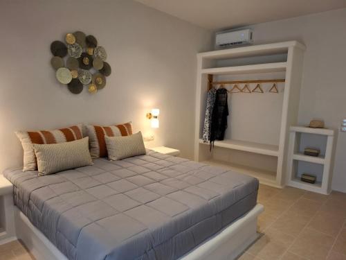 Ένα ή περισσότερα κρεβάτια σε δωμάτιο στο Tsigouri Suites