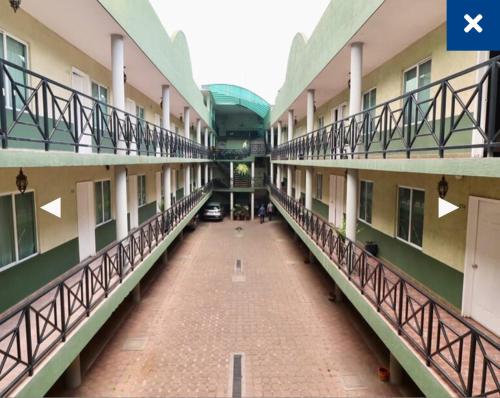 an empty hallway of an apartment building at Hotel Real Santa Rosa in Morelia