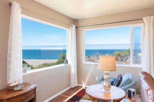 a living room with a view of the ocean at Lucky Ewe - Ocean View Retreat in Gualala