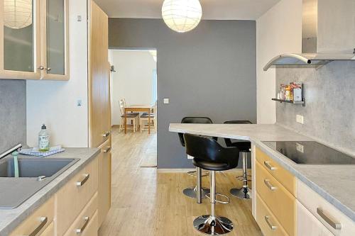 a kitchen with a sink and a counter top at Libelle in Lübben