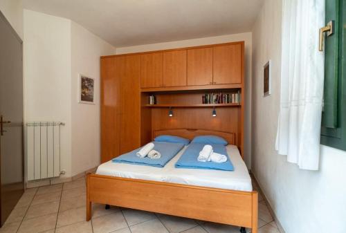 Cama o camas de una habitación en Faggio 14