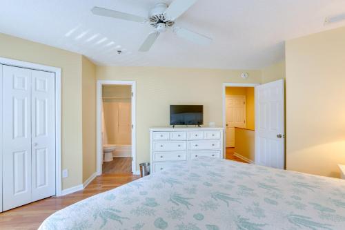 a bedroom with a bed and a ceiling fan at Walk to Forest Beach Hilton Head Getaway! in Hilton Head Island