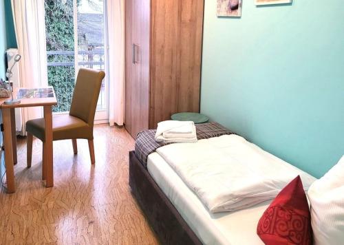 Postel nebo postele na pokoji v ubytování Strandpalais 10