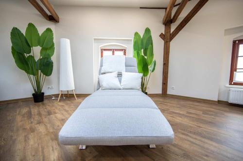 Ένα ή περισσότερα κρεβάτια σε δωμάτιο στο Exklusive Apartments im Gründerzeitjuwel
