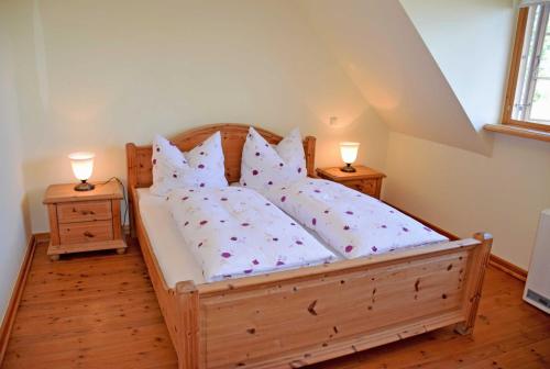 Katil atau katil-katil dalam bilik di Ferienappartements auf dem Reddevi
