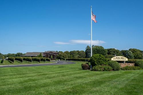 a flag pole in the middle of a park at Respite Ranch: Private Pool, Hot Tub, Beach Access in Mattituck