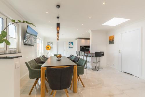 TV a/nebo společenská místnost v ubytování Ferienhaus "SAPHIR"