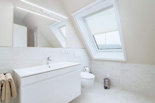 Ένα μπάνιο στο Ferienwohnung Boddenschnacker