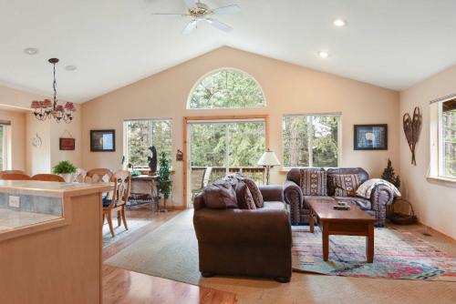 a living room with a couch and a table at Kings Beach Bliss Walk to Outdoor Fun in Kings Beach