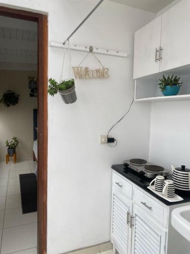 Kuchyň nebo kuchyňský kout v ubytování 102 habitacion con baño y cocina e ingreso independiente