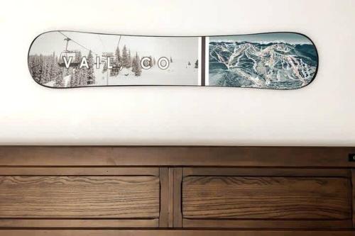 a white car with two pictures on the side of it at Studio Shred Your Cozy Mtn Refuge in Vail