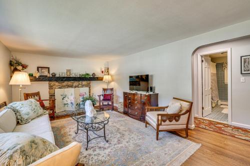 a living room with a couch and a table at Family Getaway in Bristol Near Trails and Parks! in Bristol