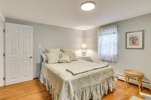 a white bedroom with a bed and a window at Family Getaway in Bristol Near Trails and Parks! in Bristol