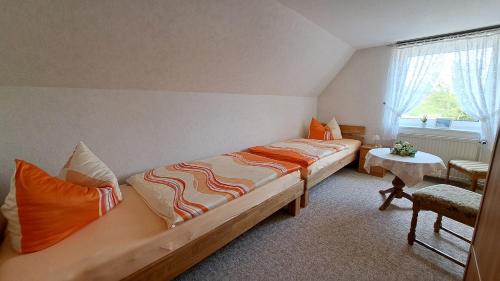Postel nebo postele na pokoji v ubytování Ferienwohnung in Lancken-Granitz