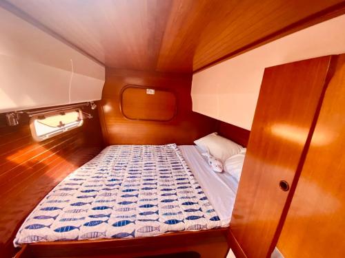 a small bed in the back of a boat at Principessa dei draghi Full Day and Night Experience in Izola