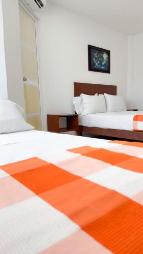 Hotel Olga Luciaにあるベッド