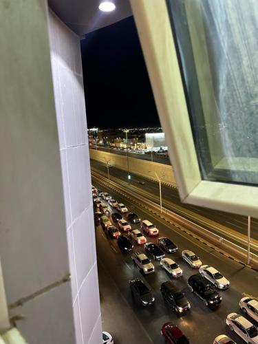 a view of a parking lot filled with cars at نُزل ڤيتا سويت Vita Suite in Hail