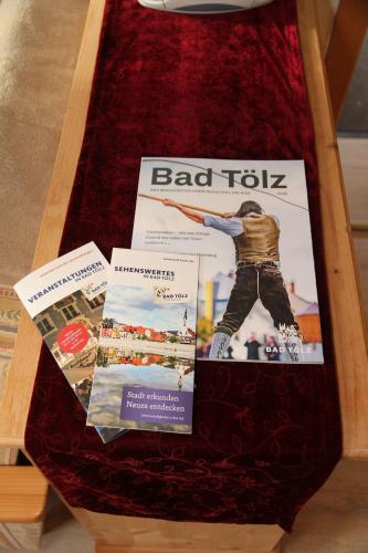 a book sitting on top of a table at Bocksleitnerhof in Wackersberg
