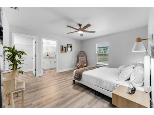 a bedroom with a bed and a ceiling fan at Rainbow Springs Paradise in Dunnellon