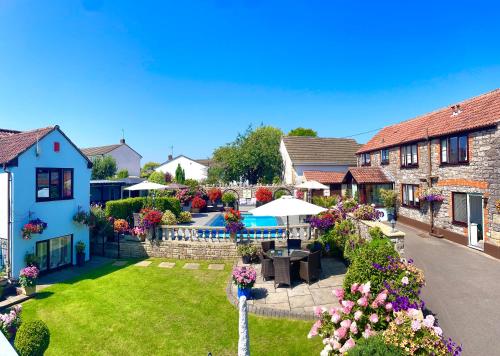 an aerial view of a house with a garden at Gordons in Cheddar