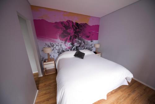 Una cama o camas en una habitación de Alquileres Temporarios by CLH Rentals