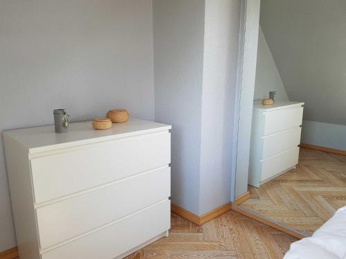 Кровать или кровати в номере Exkl FH Wörtelhus, Kamin, Sauna, W-LAN