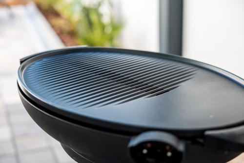 a close up of a fan on a table at LUXURY MANDRE HOUSE Apartment II with Jacuzzi in Mandre