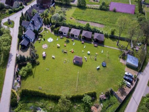an aerial view of a yard with animals on it at Holiday House cko near Baltic Beach in Łacko