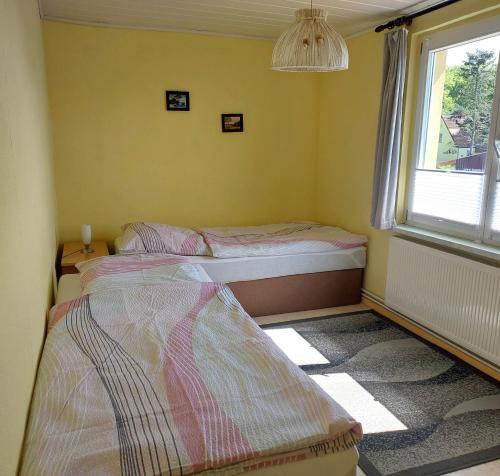 Postel nebo postele na pokoji v ubytování Ferienwohnung Helma