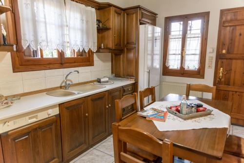 Kuchyň nebo kuchyňský kout v ubytování Aria Archontiko Pelion