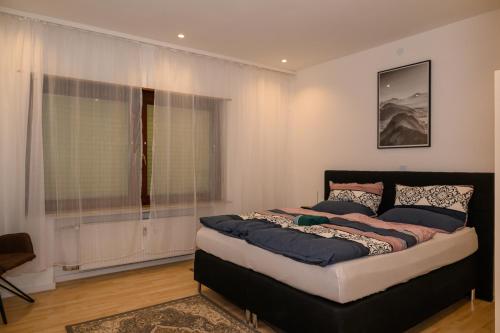 En eller flere senge i et værelse på Rehoboth Apart