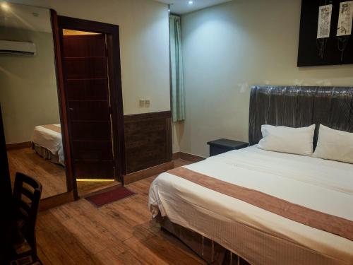 Photo de la galerie de l'établissement قصر العارض للشقق المخدومة, à Al Muzāḩimīyah