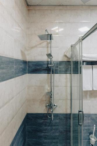 Koupelna v ubytování Metro City Hotel